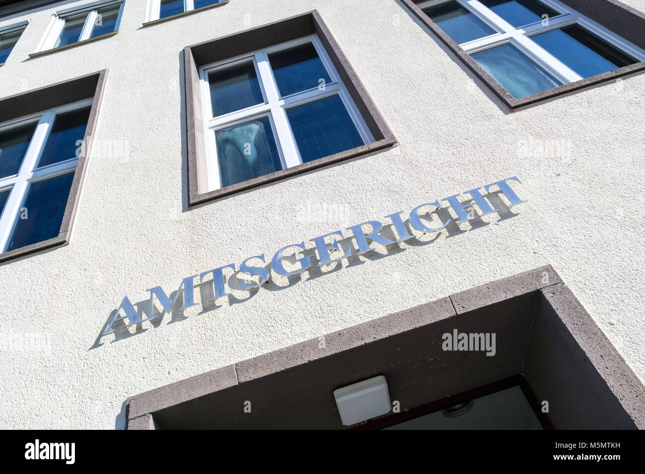 lettering at the entrance of a German district court Stock Photo