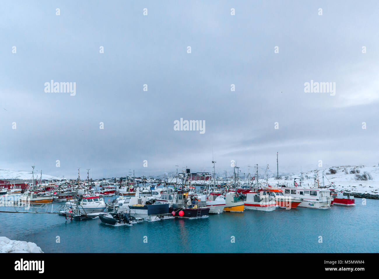 From the small fishing village of Batsfjord, Finnmark county, north Norway. Most of the fishing fleet is in port due to bad weather forecast. Stock Photo