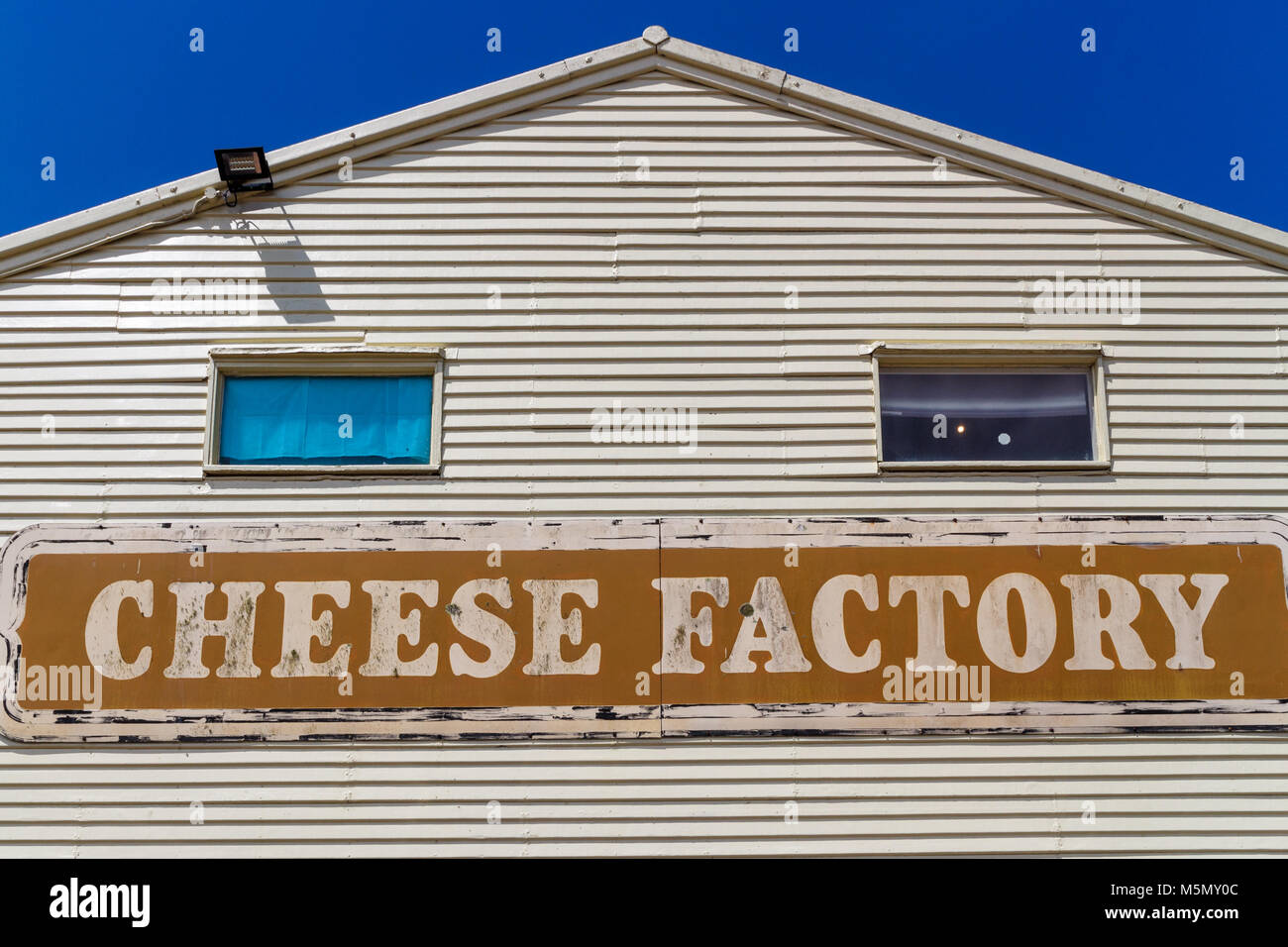 Cheese factory sign on clapperboard building, New South Wales, NSW