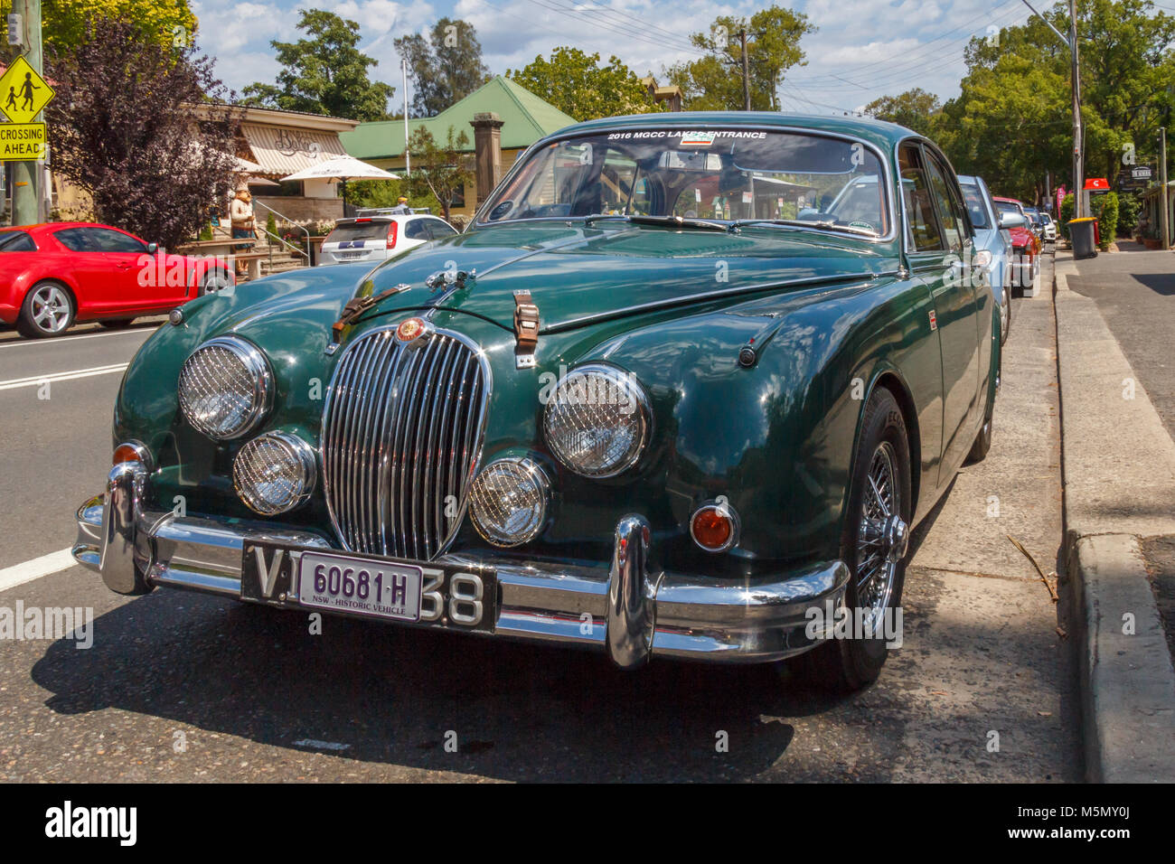 classic British Racing Green Jaguar roadster sports car, Kangaroo Valley, New SOuth Wales, Australia Stock Photo