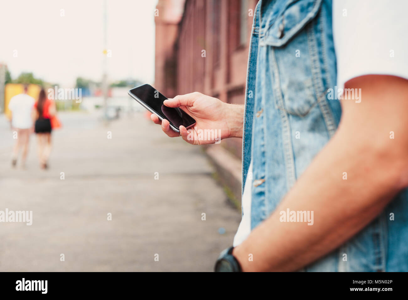 Close up of a man using mobile smart phone Stock Photo - Alamy