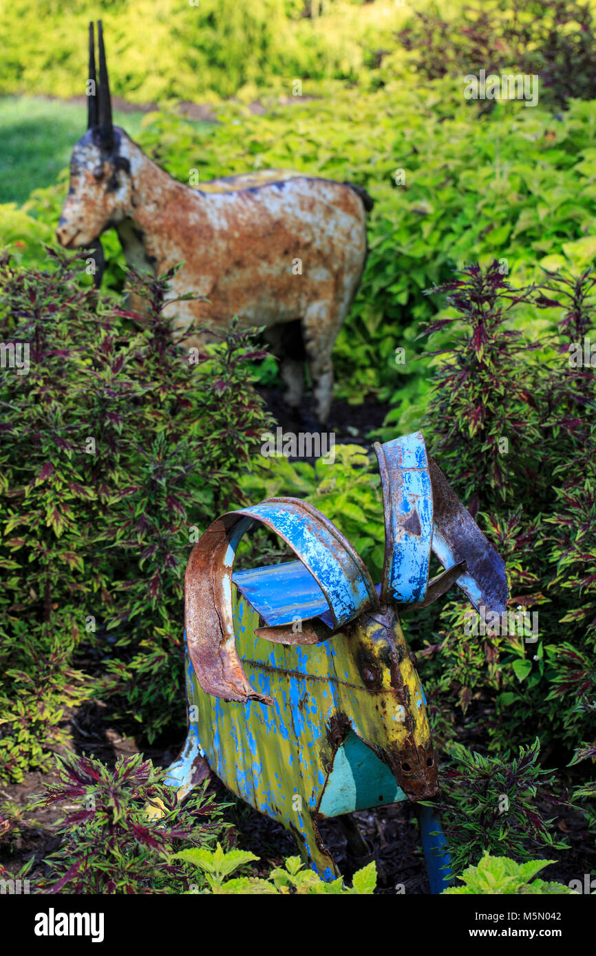 Metal sculpture in foliage at Wegerzyn Gardens MetroPark in Dayton, Ohio Stock Photo