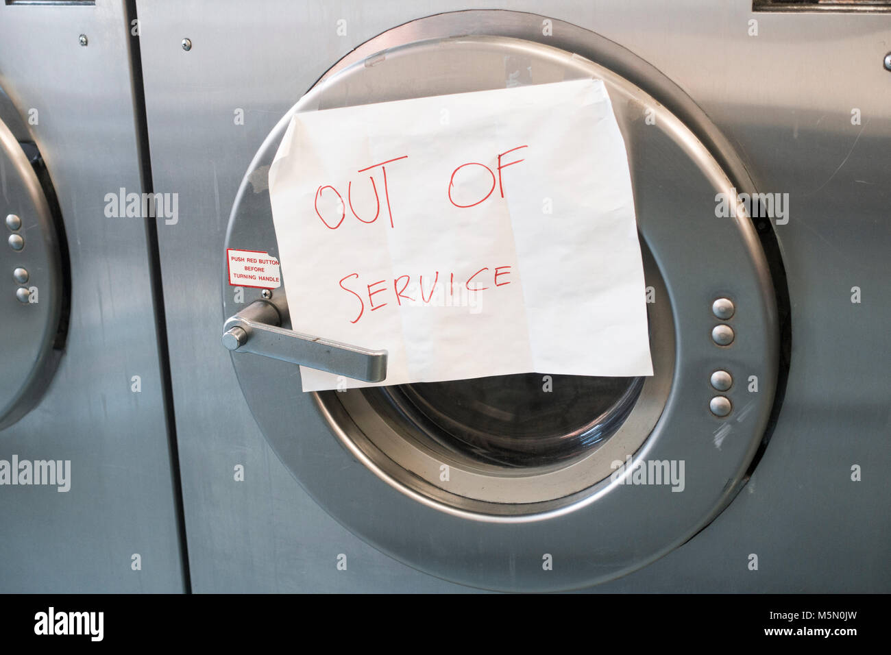 out of order washing machine industrial Stock Photo Alamy