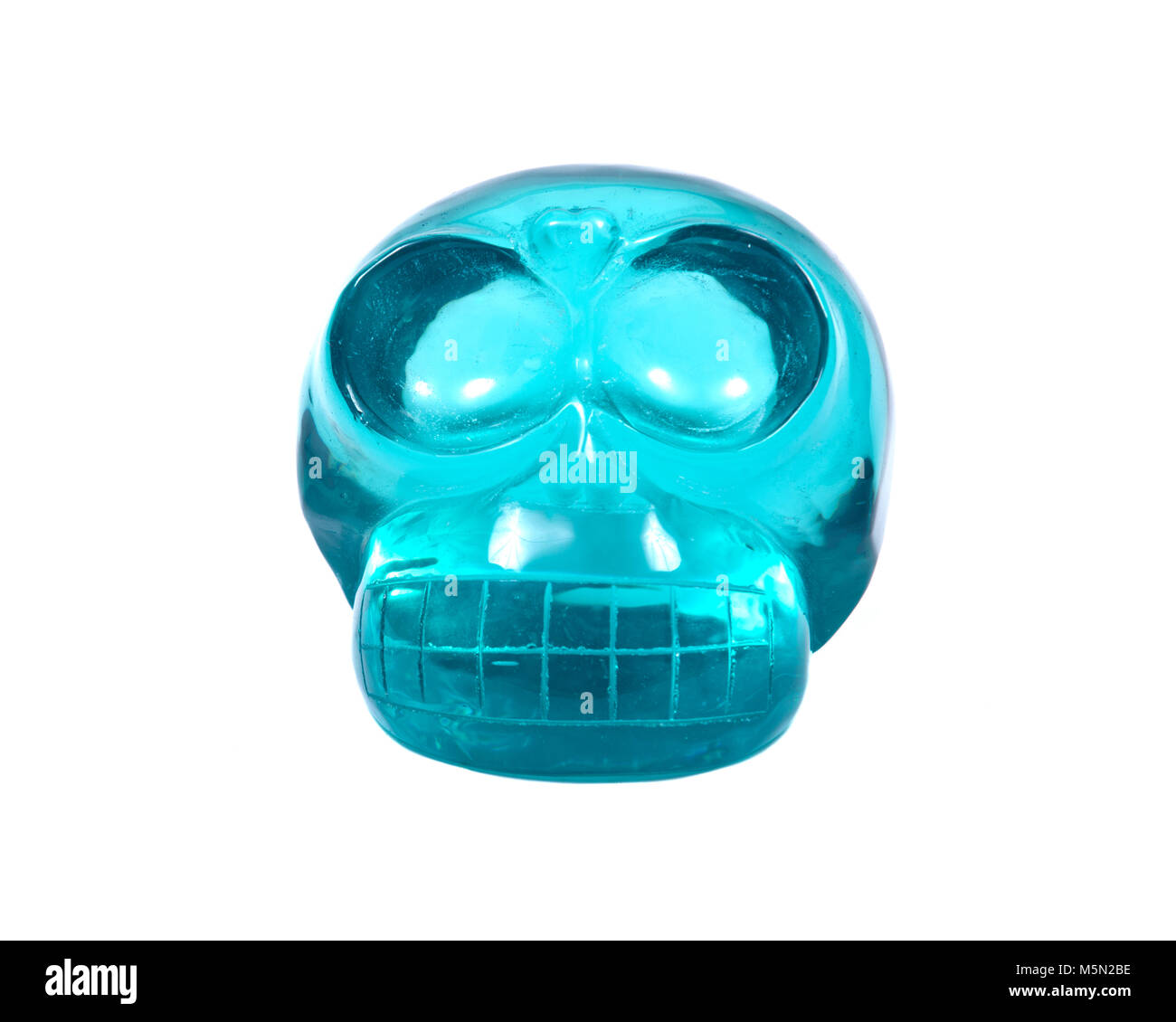 Blue green obsidian skull isolated on white background Stock Photo Alamy
