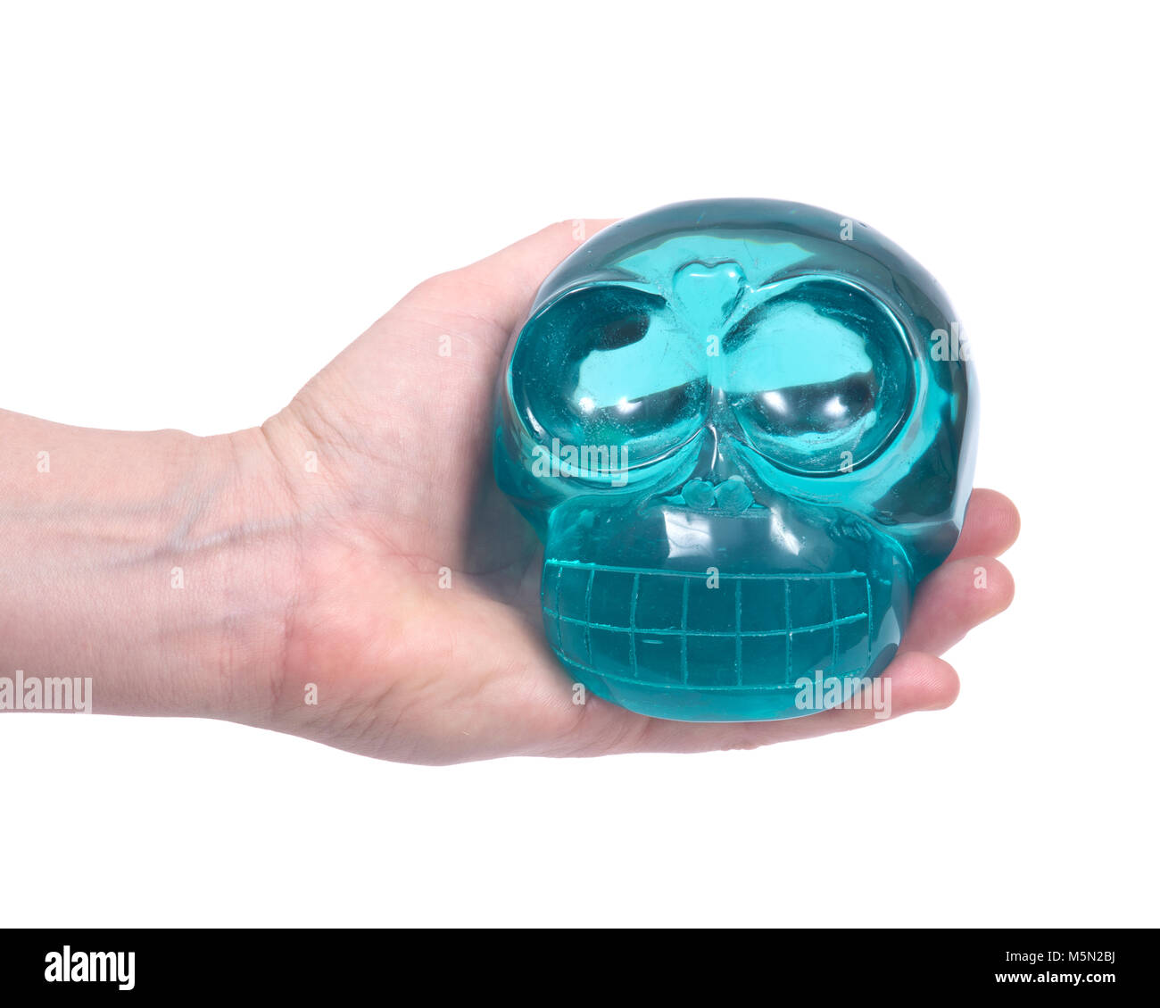 Blue green obsidian skull isolated on white background Stock Photo Alamy