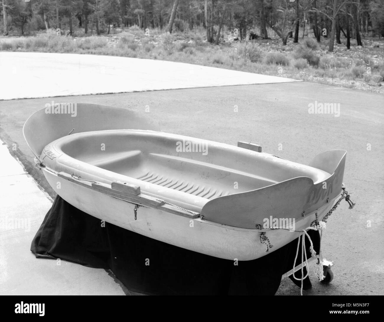 GRCA   Grand Canyon Historical Boat CollectionSportyak II (Dock) . Catalog # GRCA 9085  Object:  BOAT Description:   Sportyak named the 'Dock'.  The 'Dock' is a Sportyak II, made by Dayton Marine Products, Inc. and is vacuum formed of linear polyethelene. Length: 88 3/8 inches;  Beam: 44 1/2 inches;  Height of bow: 21 1/4 inches;  Height of transom 16 inches;  Height of midship 14+ inches: Weight: 38 pounds This boat was used by Otis ’Dock’ Marston for a com Stock Photo