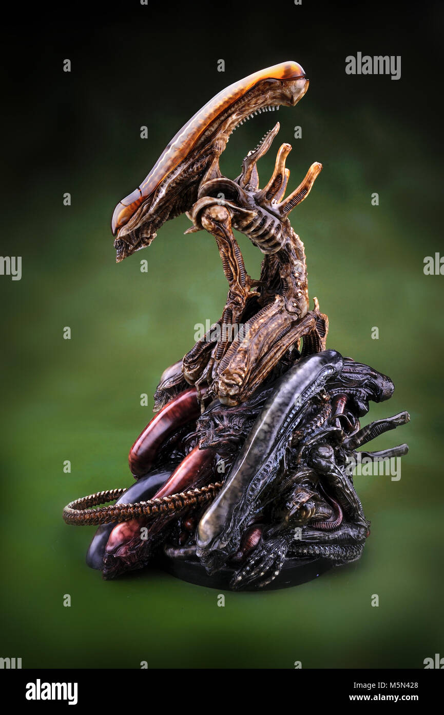 figer hobby toy model alien in green background Stock Photo