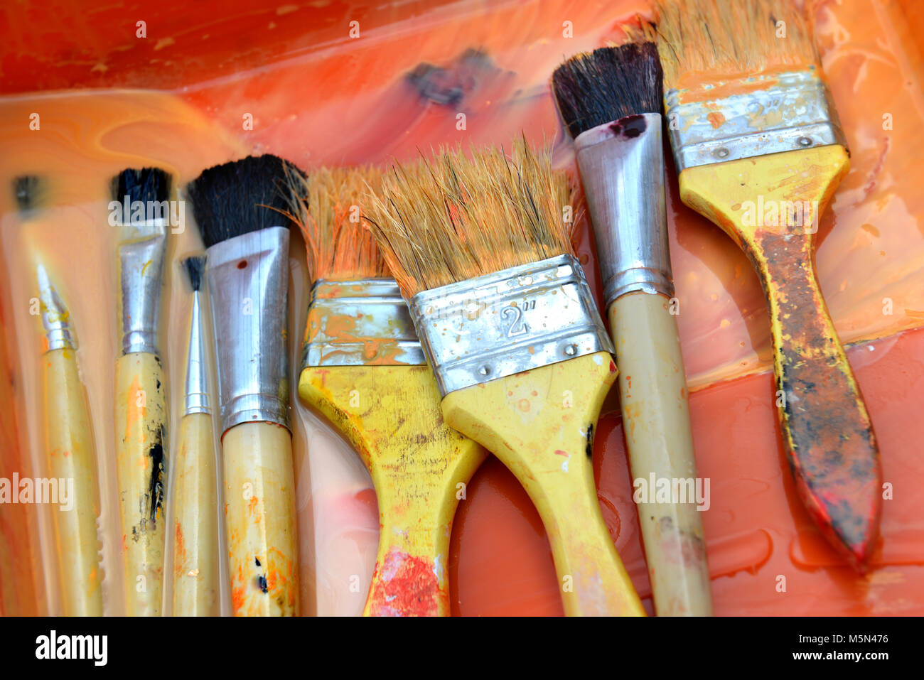 Color brush paint mix work on time Stock Photo - Alamy