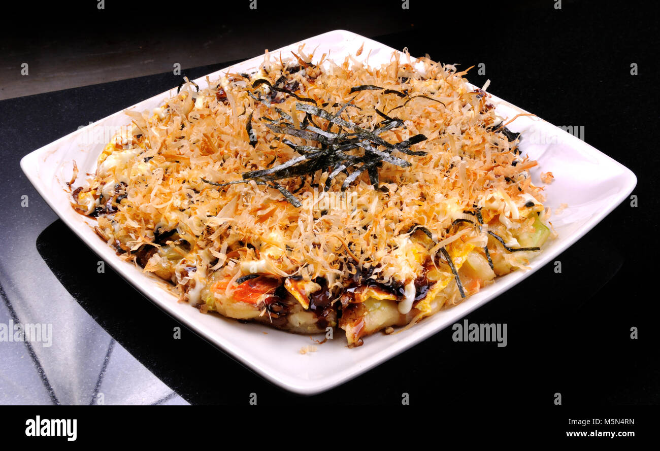 Japanese Okonomiyaki is japanese pizza great and yammy Stock Photo Alamy