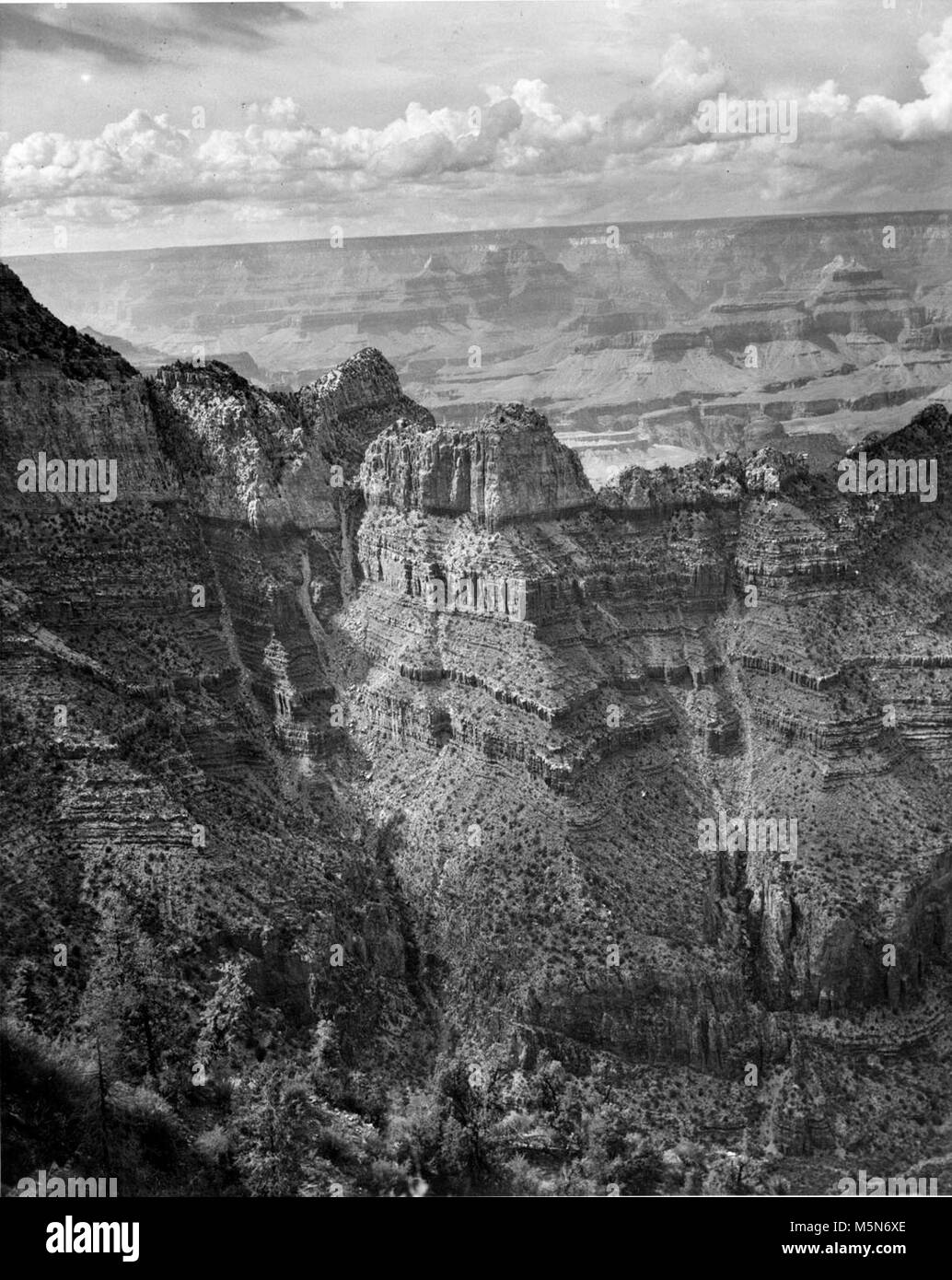 B Grand Canyon Historic Grandview Trail . View of grand canyon from near grandview point.  Grandview to buggeln hill, grand canyon national park.   Circa 1963. Impressions of the dazzling topography of Grand Canyon have changed and shifted since that day in the summer of 1540 when Garcia Lopez de Cardenas gazed out from the South Rim. The conquistador saw a worthless desert wasteland, nothing more than a barrier t Stock Photo