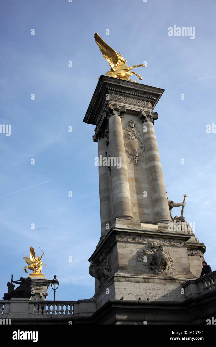 Pont Alexandre III spanning La Seine and connecting the Champs-Élysées  with the Invalides and Eiffel Tower - Paris Stock Photo