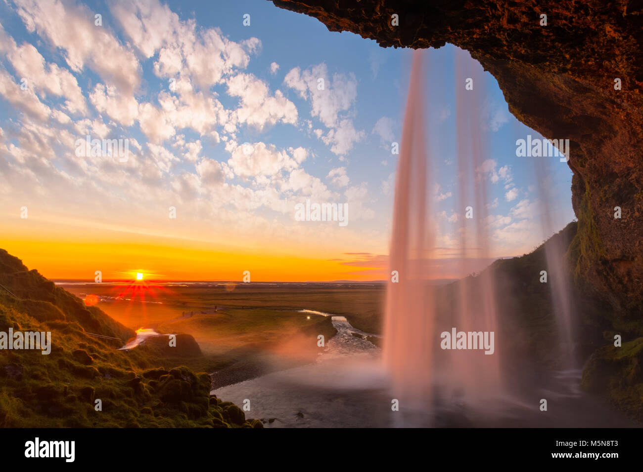 Seljalandsfos Waterfall at sunset, Iceland Stock Photo