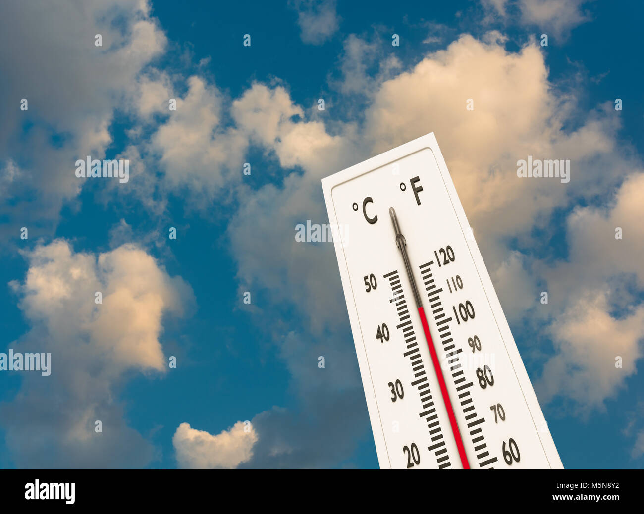Thermometer on the summer heat Stock Photo