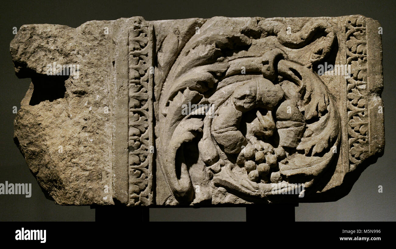 Detail of the left jamb of a monumental door decorated with acanthus leaves, a squirrel and a snake. Limestone and marble. Roman-Germanic Museum. Cologne. Germany. Stock Photo