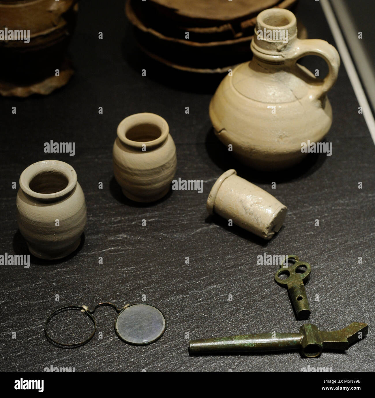 Middle Ages. Group of ceramic objects (jugs, cups, etc.) belonging to a Beguine Community. Stolkgasse. 13th century. Roman-Germanic Museum. Cologne. Germany. Stock Photo