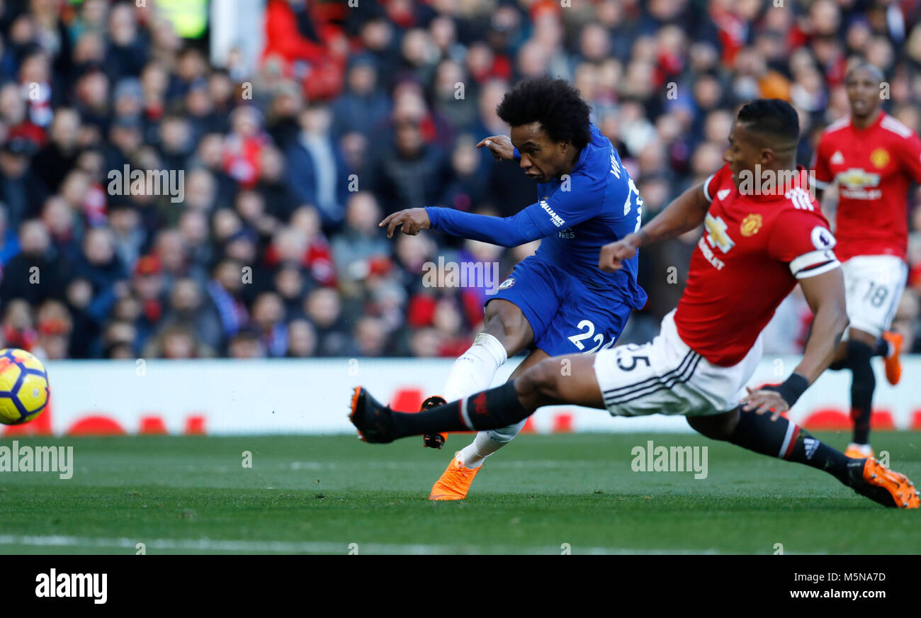 Chelsea's Willian scores his side's first goal of the gamel of the game during the Premier League match at Old Trafford, Manchester. Stock Photo