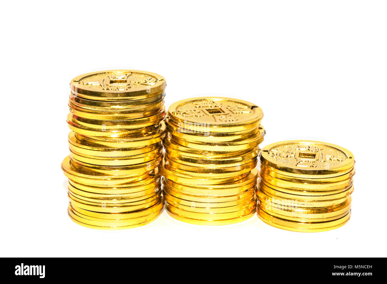Stack of Chinese golden coins  isolate Stock Photo