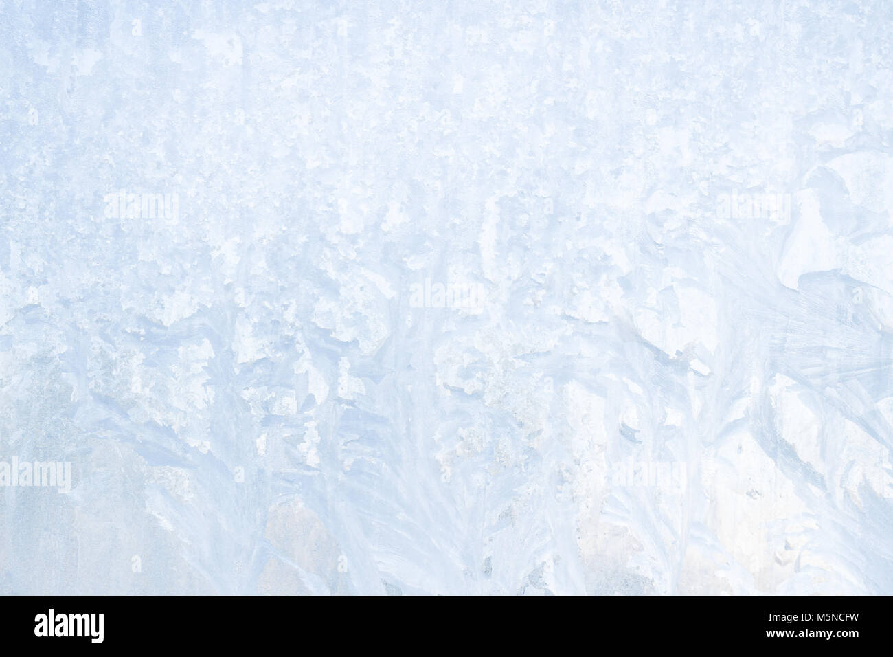 Winter frosty patterns on the frozen ice window Stock Photo - Alamy