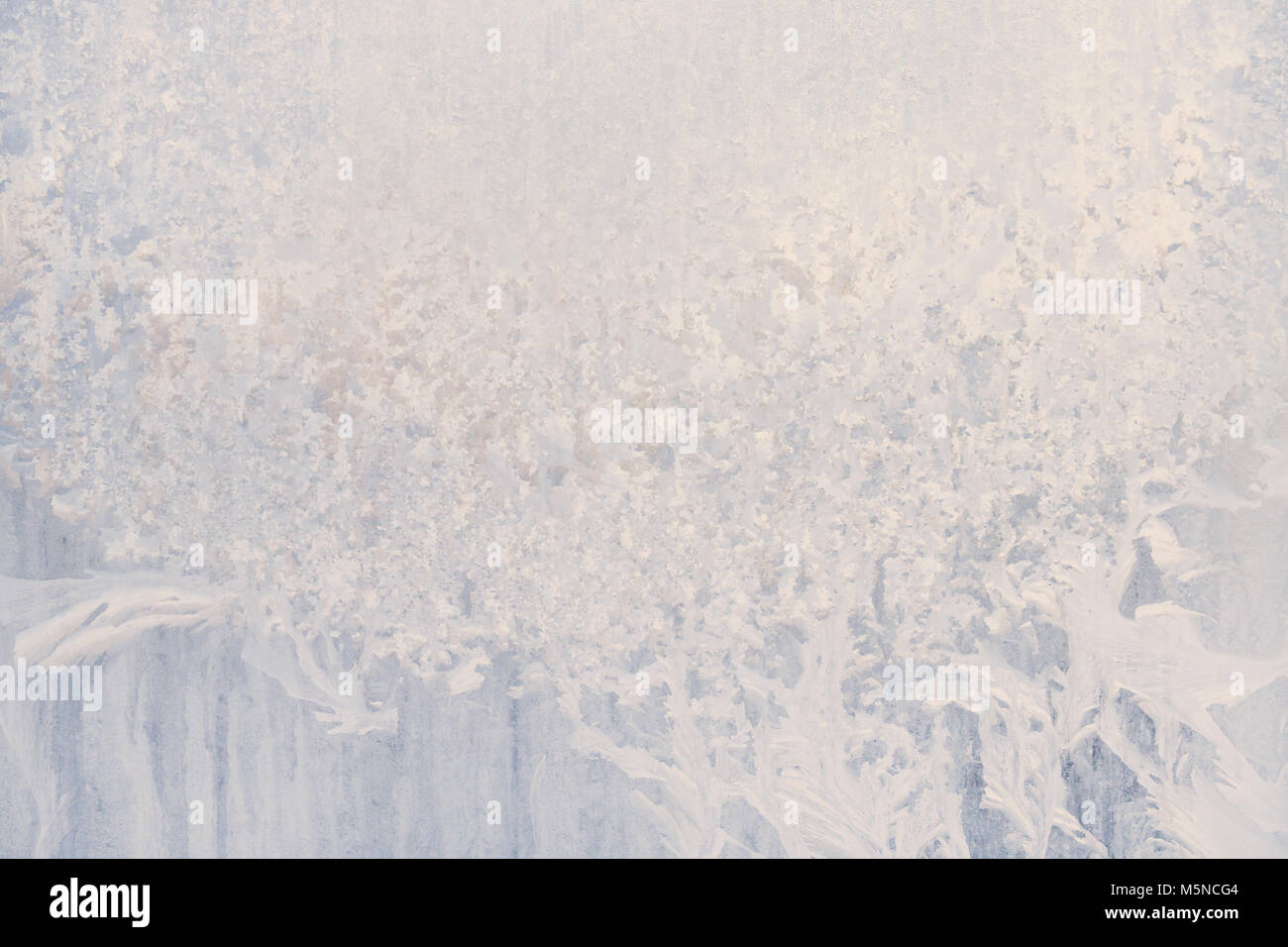 Winter frosty patterns on the frozen ice window Stock Photo - Alamy