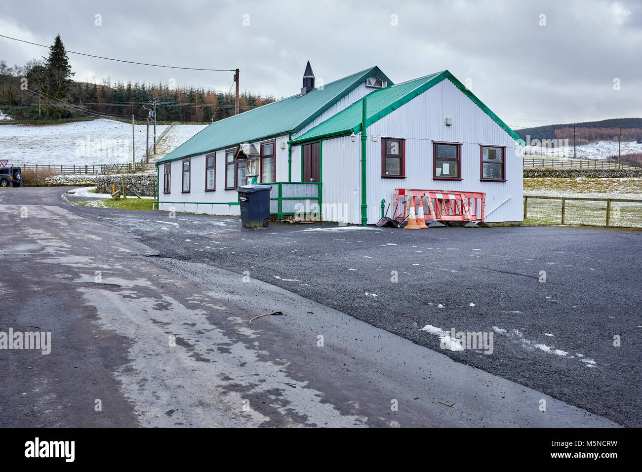 A wintery and well kept village hall at Bentpath. Westerkirk. Stock Photo