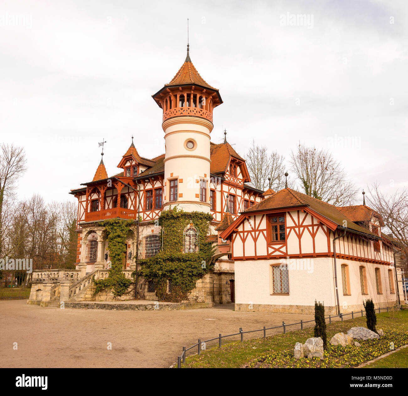 Beautiful House with a Big Tower by the Lake During Winter Season Stock  Photo - Alamy