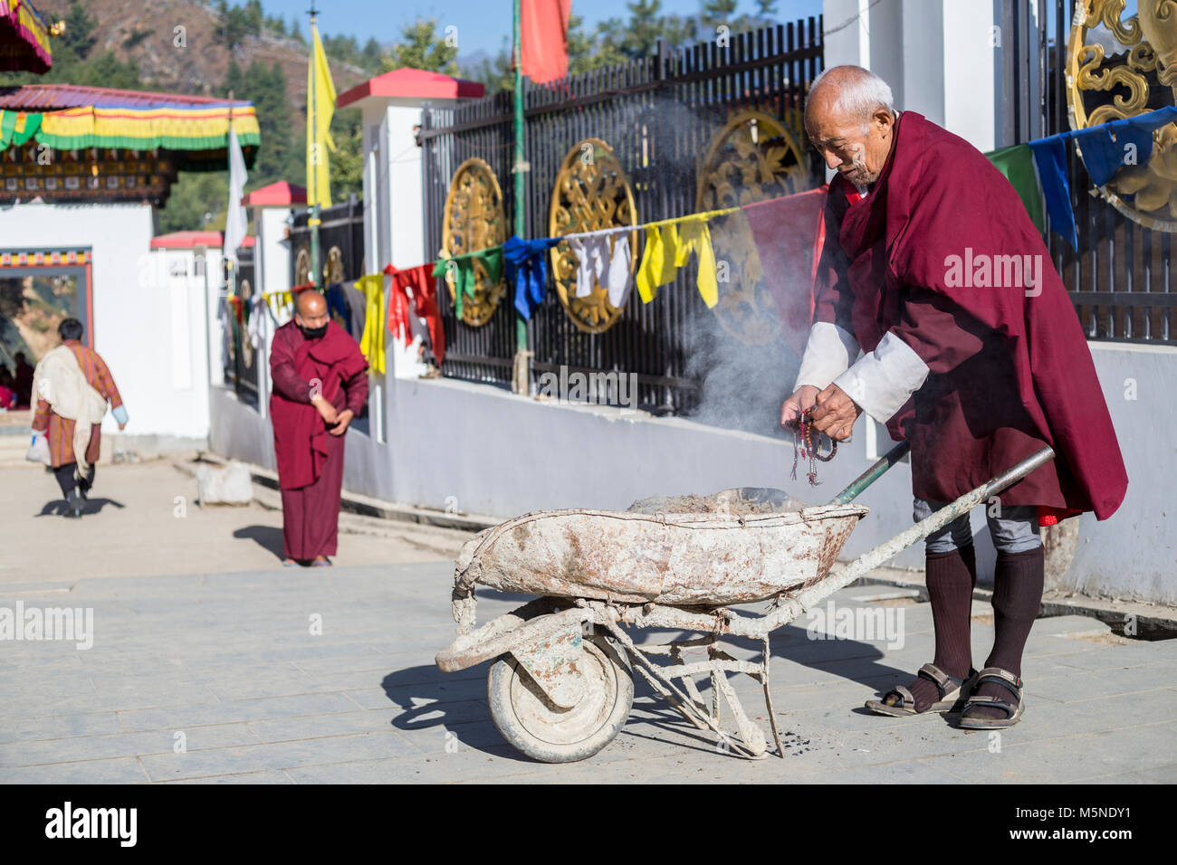 Thimphu, Bhutan. Buddhist Monk Holding Hands and Prayer Beads over ...