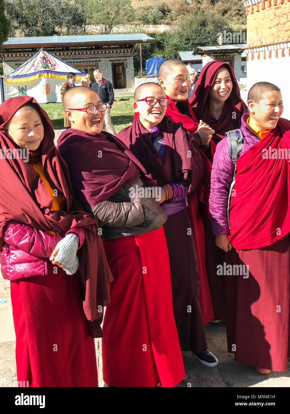 Bumthang, Bhutan. Young Buddhist Monks (Acolytes) Ready to Attend a Religious Festival at  Jambay Lhakhang (Monastery/Temple). Stock Photo