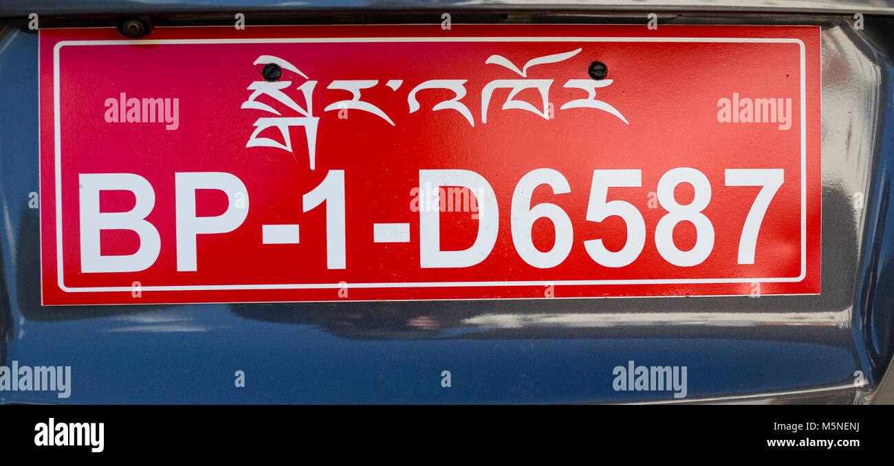 Thimphu, Bhutan.  Bhutanese Vehicle License Plate, Showing Dzongkha Written in Tibetan Alphabet. Stock Photo
