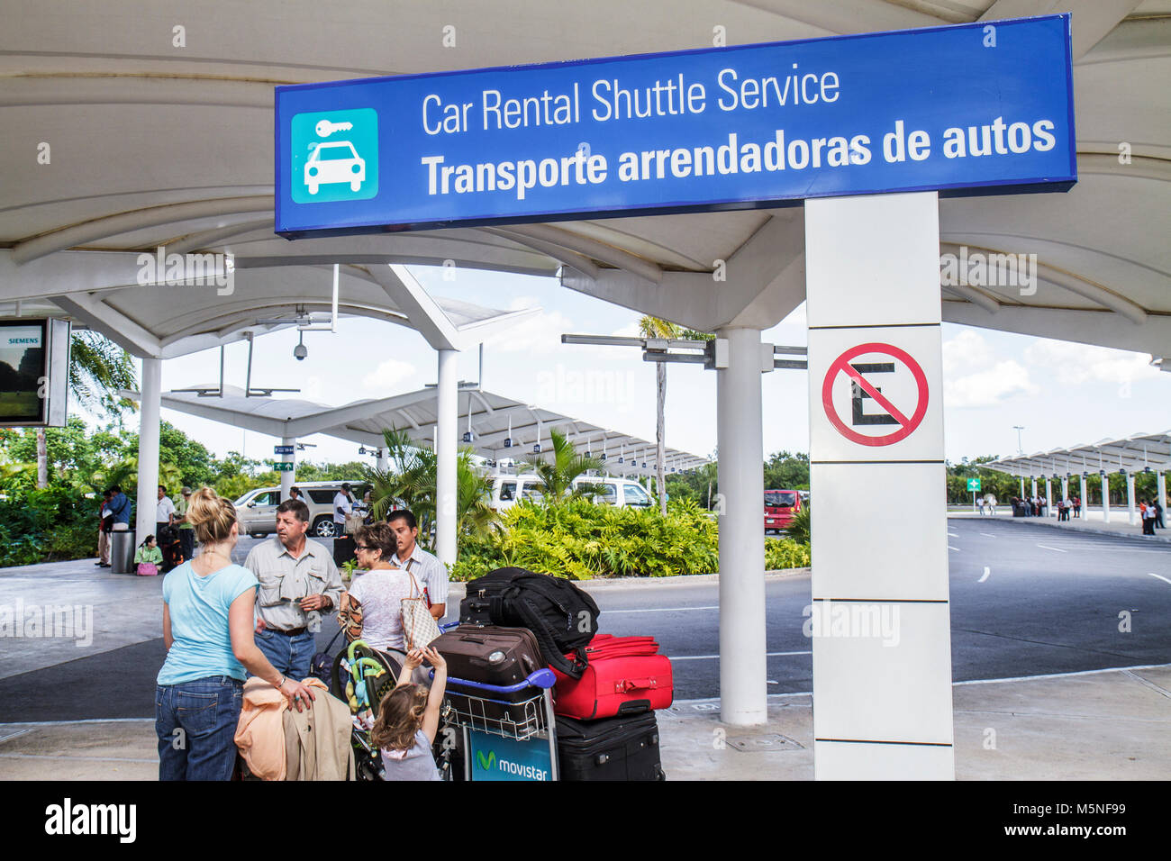 Cancun Mexico,Mexican,Cancun International Airport,car rental,shuttle service,man men male,woman female women,girl girls,youngster,kids children famil Stock Photo