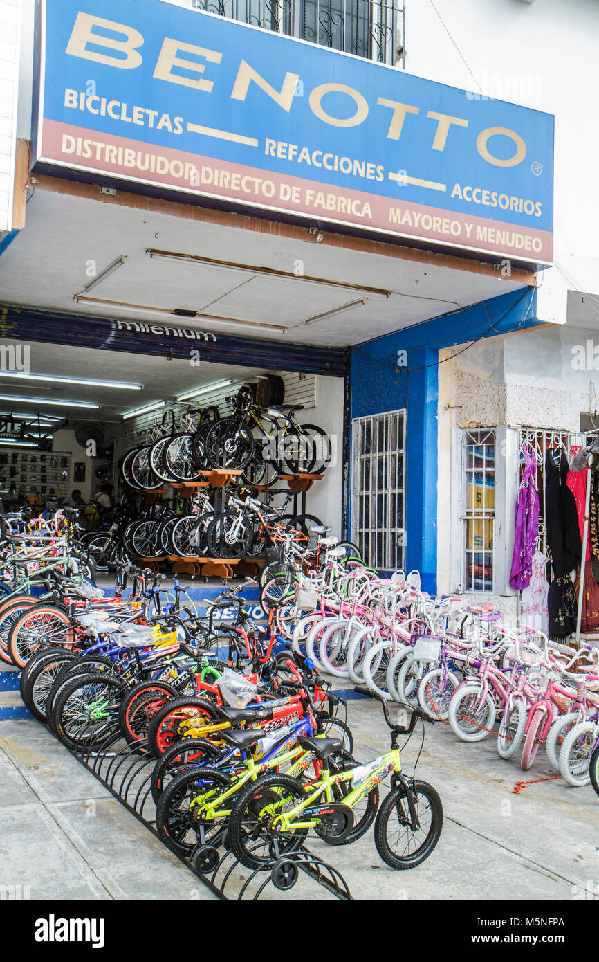 Cancun Mexico,Mexican,Avenida Tankah,bicycle shop,bikes,display case  sale,shopping shopper shoppers shop shops market markets marketplace buying  selli Stock Photo - Alamy