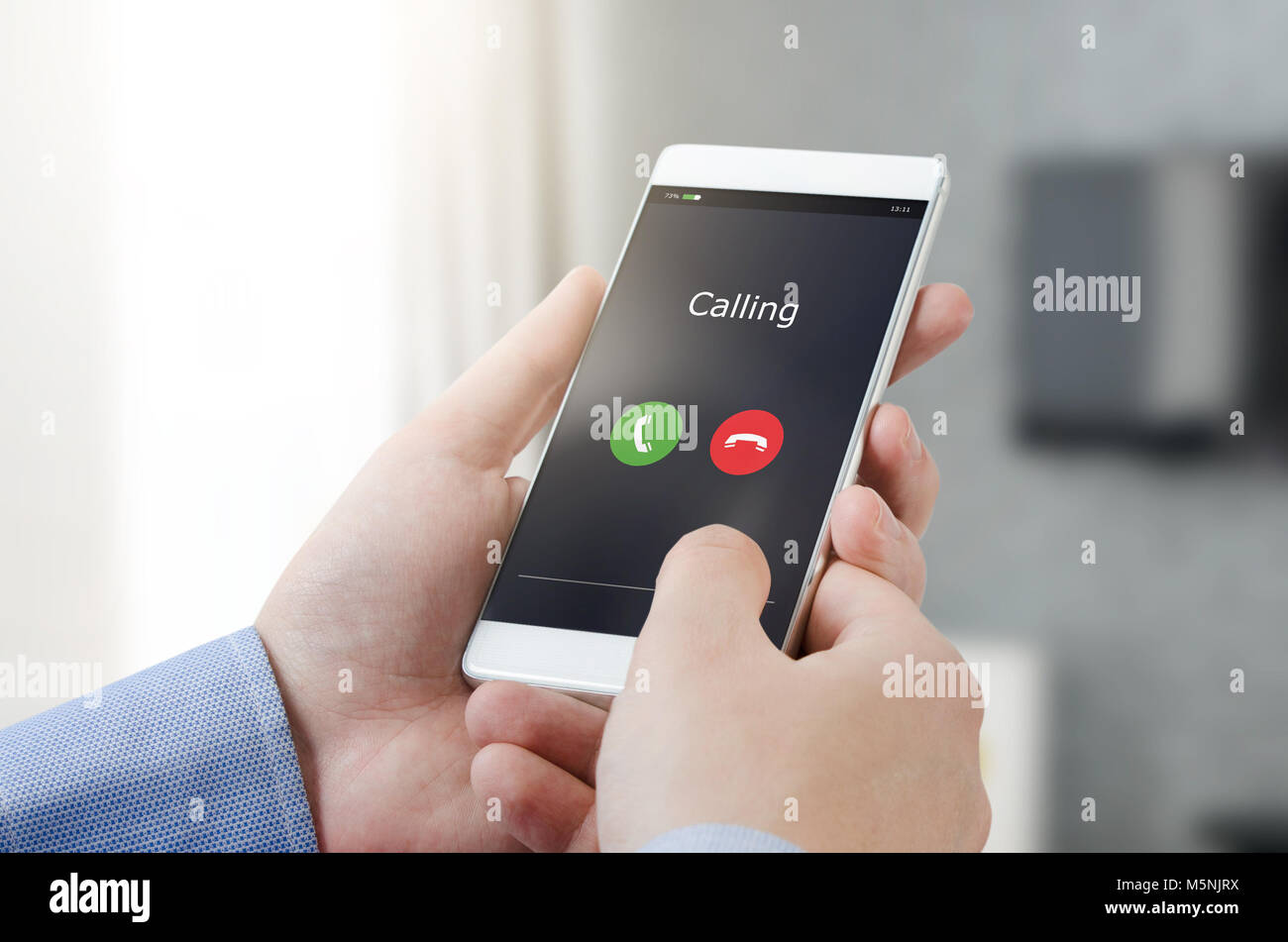 Man using a mobile phone. Making a call on a mobile device. mobile smart phone call calling interface man hand concept Stock Photo