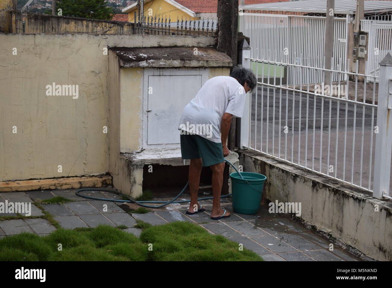 Bucket water filling hires stock photography and images Alamy