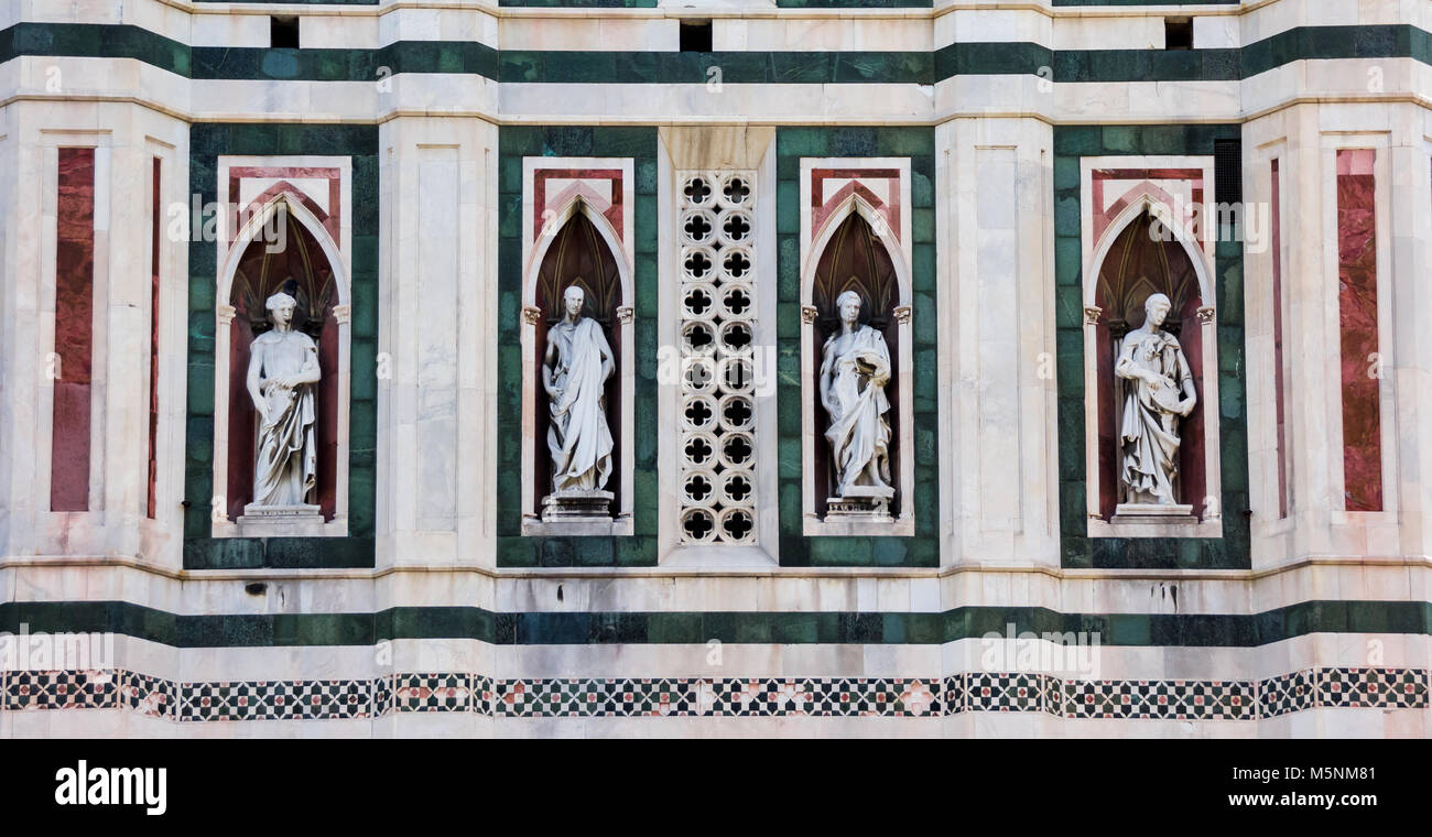 Statues on the facade of the Duomo in Florence, Italy Stock Photo