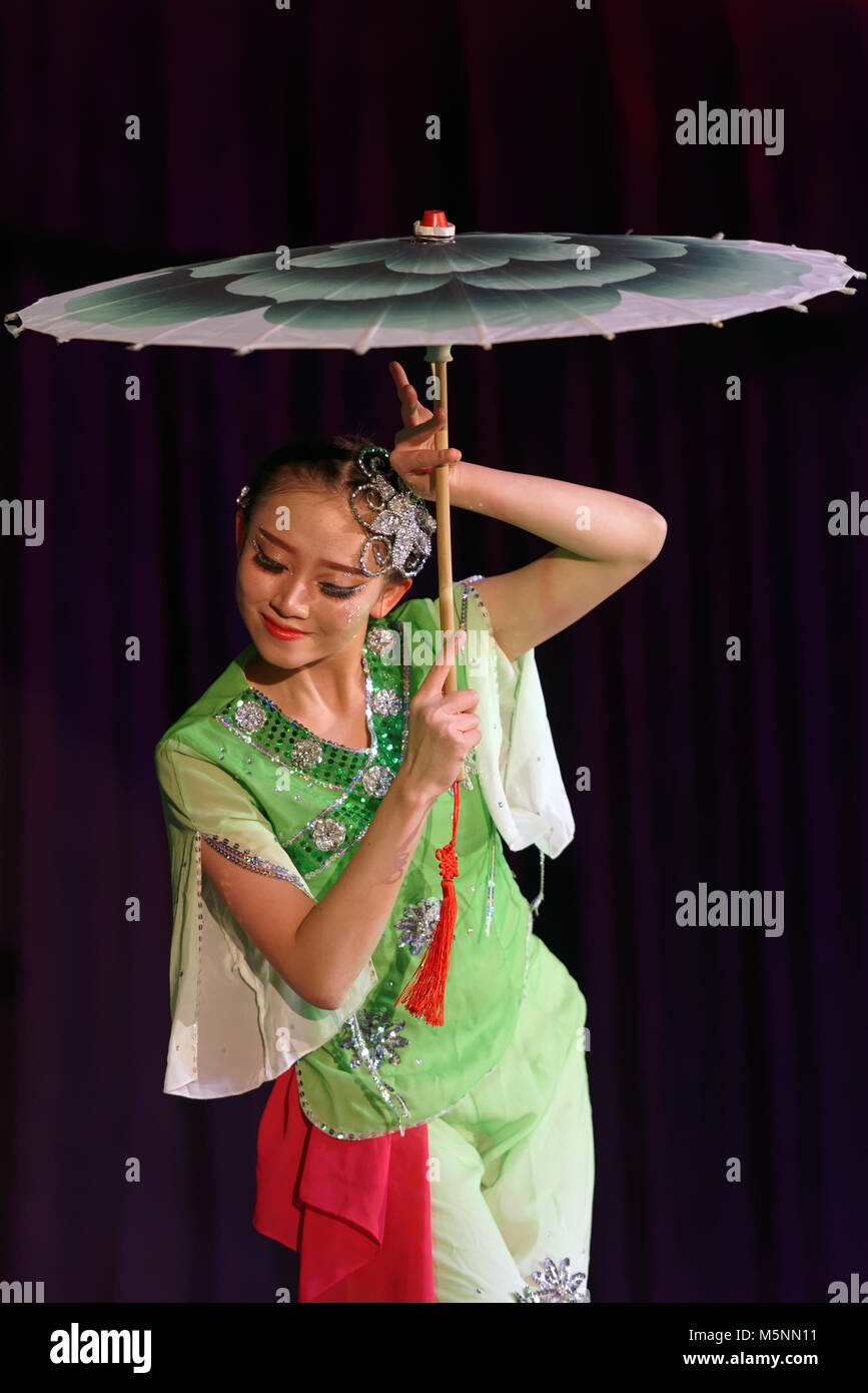 Saint-Petersburg, Russia - February 6, 2018: Lee Jing-Jing performs the dance with umbrella during the Dance festival of young people of China and Rus Stock Photo