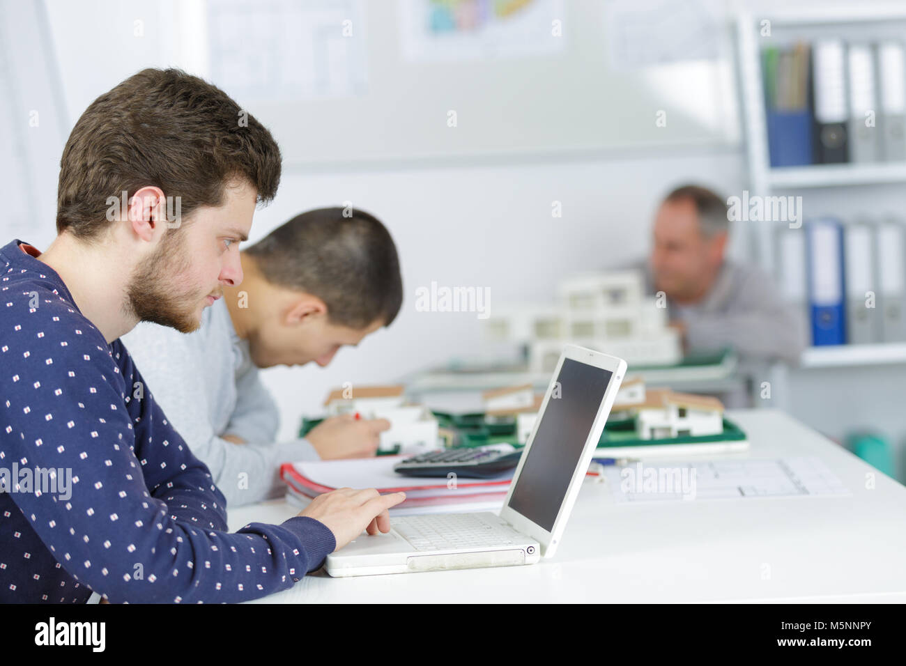 teacher with students in architecture school Stock Photo - Alamy