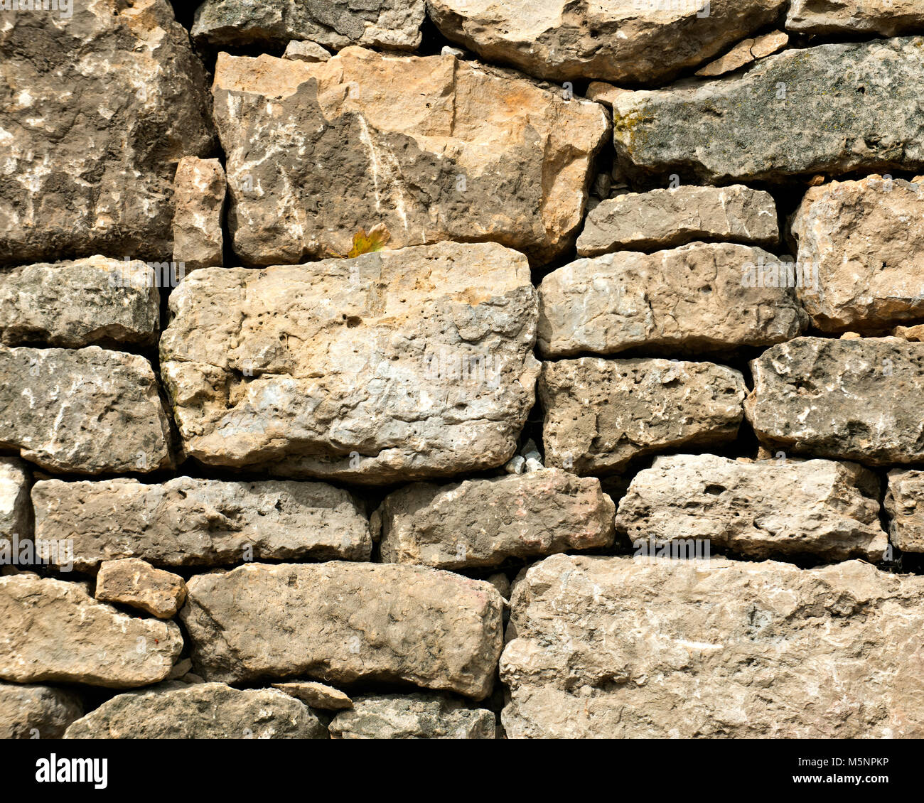 Natural carved stone wall like art texture, background Stock Photo - Alamy