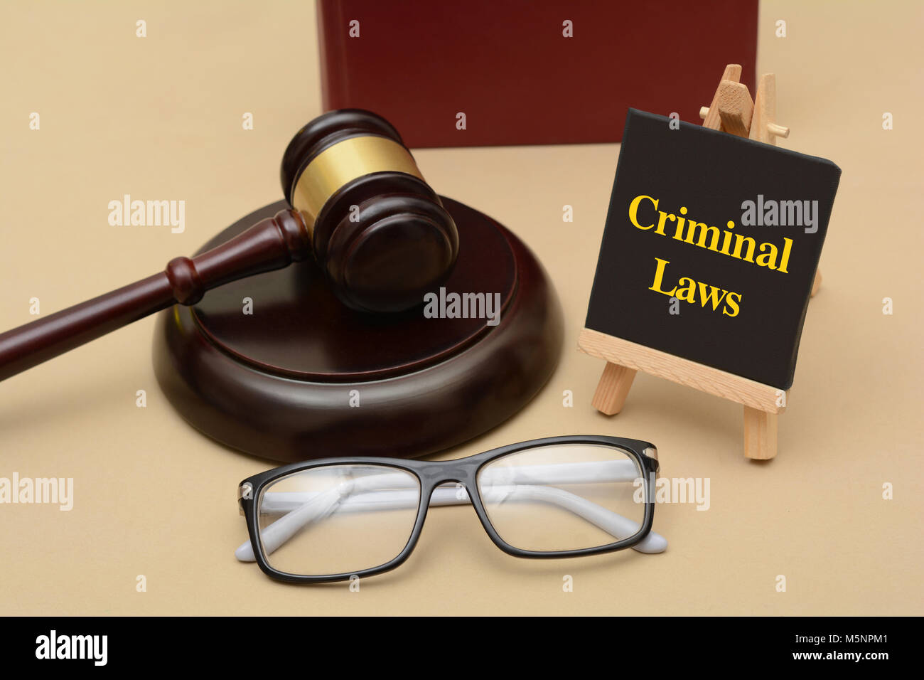 Criminal Law sign with wooden gavel Stock Photo