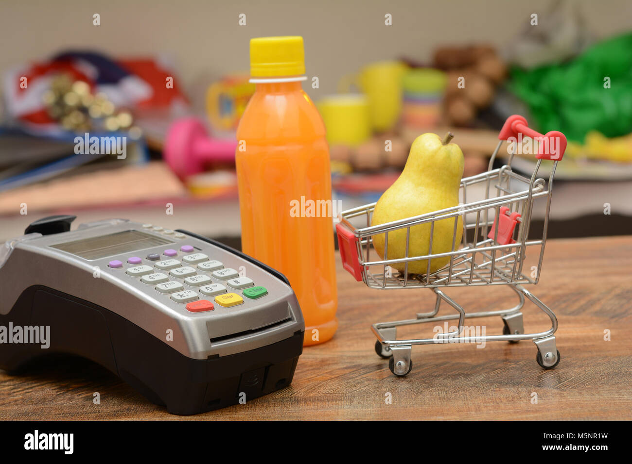 Grocery shopping cart with credit card reader Stock Photo Alamy