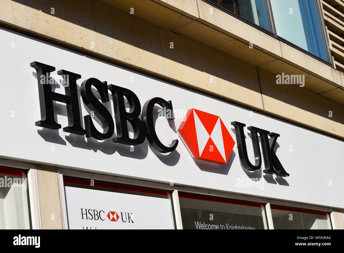 HSBC UK high street bank logo sign, Brompton Road, Knightsbridge, London, UK. Banking sector Stock Photo