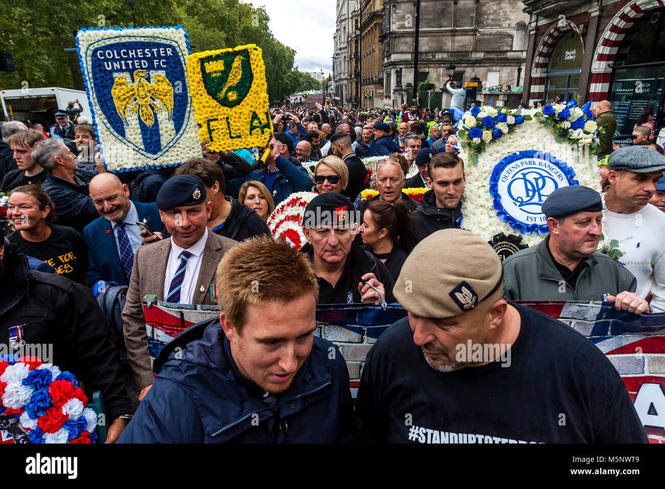 Former British soldiers join The Football Lads Alliance (FLA) march in Central London against extremism, London, UK Stock Photo