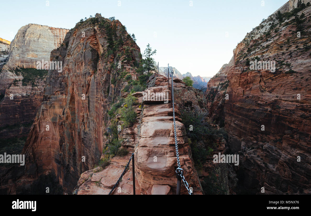 Famous Angels Landing hiking trail overlooking scenic Zion Canyon in beautiful post sunset evening twilight in summer, Zion National Park, Utah, USA Stock Photo