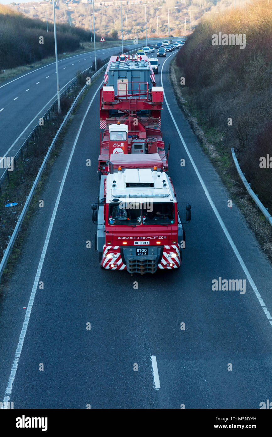 A27, Hove, East Sussex, UK; 25th February 2018; Electricity Transformer Being Transported by Road from Shoreham Port to Henfield.  Load is 78 Metres Long, 4.6 Metres Wide and Weighs About 331 Tonnes. Credit: Ian Stewart/Alamy Live News Stock Photo