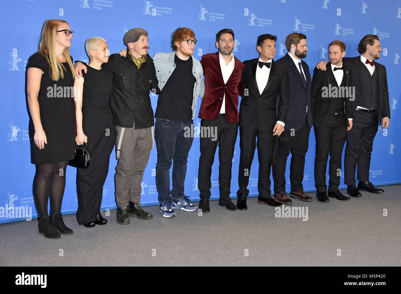Berlin, Germany. 23rd Feb, 2018. Maleri Sevier, Kimmie Kim, Foy Vance, Ed Sheeran, Murray Cummings, Alejandro Reyes-Knight, Ben Wainwright-Pearce, Billy Cummings and William Bean during the 'Songwriter' photocall at the 68th Berlin International Film Festival/Berlinale 2018 on February 23, 2018 in Berlin, Germany. | usage worldwide Credit: dpa/Alamy Live News Stock Photo