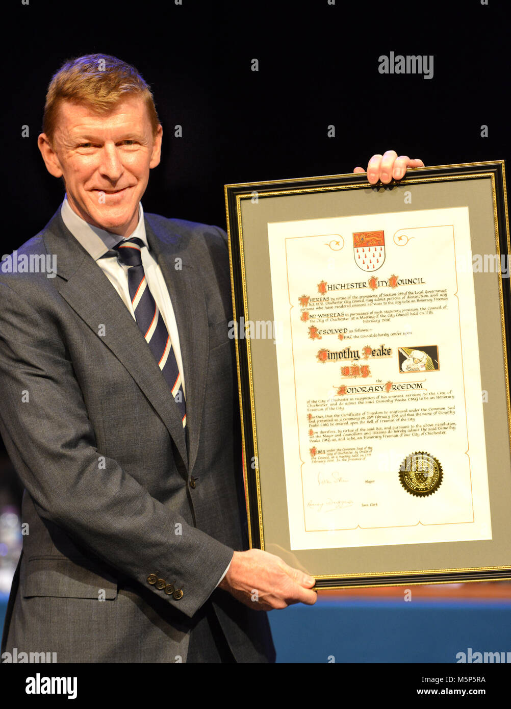 Chichester, UK. 25th February 2018. Astronaut Tim Peake receives the freedom of the City of Chichester, his home city, from Mayor Peter Evans. CAP/Alamy Live News Stock Photo