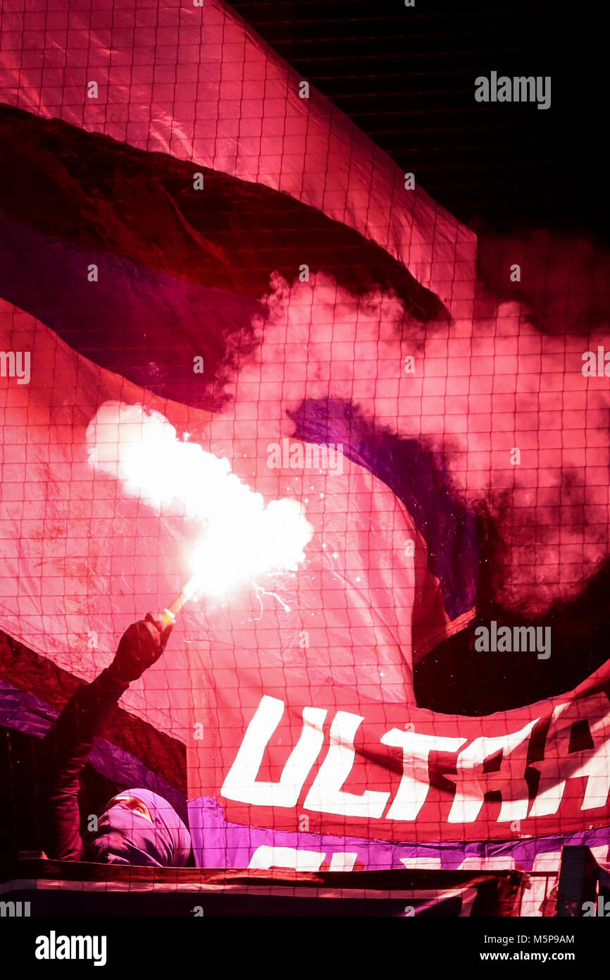 24 Febuary 2018, Germany, Bremen, German Bundesliga soccer match between Werder Bremen and Hamburger SV, Weserstadion: Hamburg's fans light flares. Photo: Christian Charisius/dpa - Nutzung nur nach vertraglicher Vereinbarung Stock Photo
