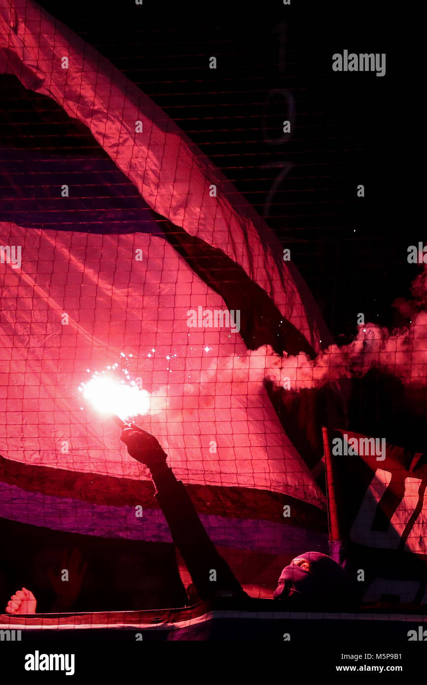 24 Febuary 2018, Germany, Bremen, German Bundesliga soccer match between Werder Bremen and Hamburger SV, Weserstadion: Hamburg's fans light flares. Photo: Christian Charisius/dpa - Nutzung nur nach vertraglicher Vereinbarung Stock Photo