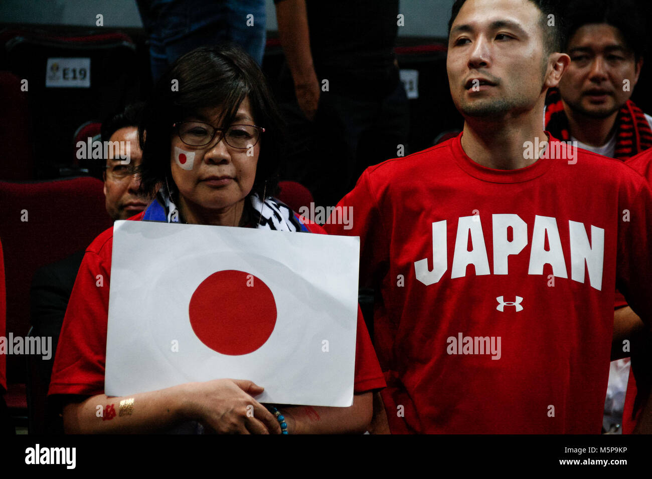 Philippines. 25th Feb, 2018. Japanese fans during the qualifying game at the MOA Arena.The Philippine and Japanese basketball team met at the hardcourt of the Mall of Asia Arena in Pasay City, for the FIBA World Cup 2019 Asian Qualifiers. The Philippines won over Japan, 89-84. Credit: J Gerard Seguia/ZUMA Wire/Alamy Live News Stock Photo