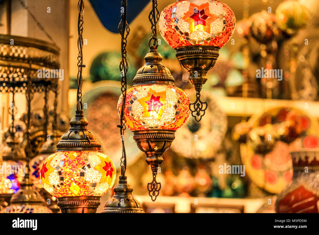 Traditional bright decorative hanging Turkish lights and colourful light lamps with vivid colours  in Turkey Pavilionq Stock Photo