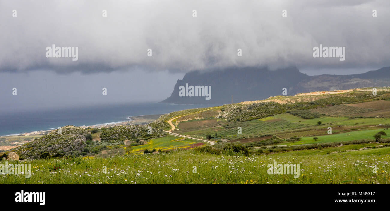 Storm clouds crossing the coast of Sicily, Italy. Stock Photo