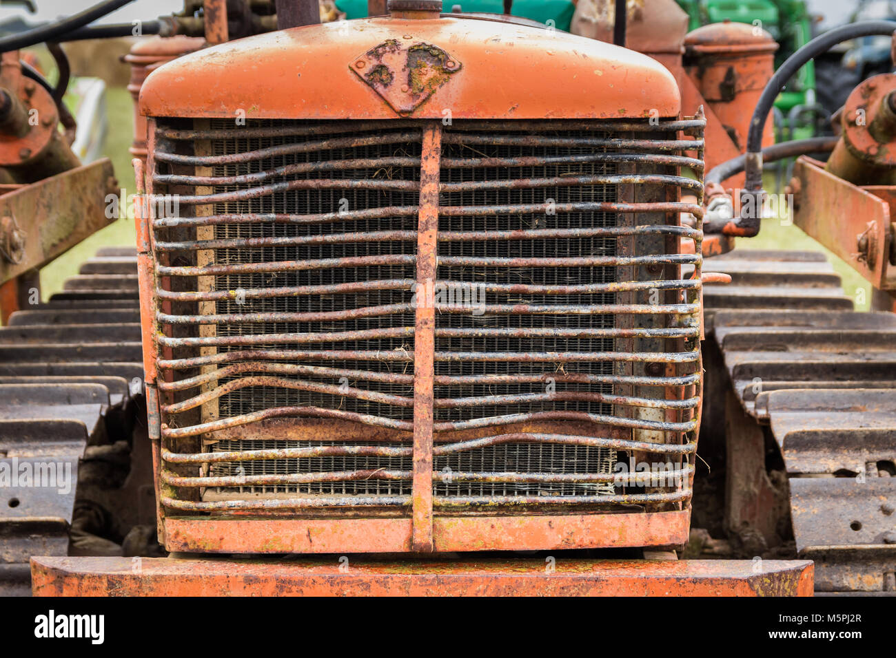 Front part of a vintage bulldozer shoing it's grill. Stock Photo